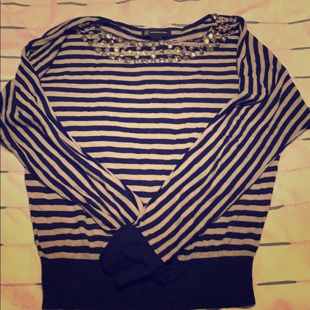 Blue and beige sweater.
